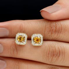 Product Details These Vintage Stud Earrings for Women are set in gold, it consists of Round Shape Citrine embellished in Prong Setting with Round Shape Diamond embellished in Pave Setting, for your happiness and shine. Product Information SKU SHP-EARRINGS042171390 Weight 1.76 gm (Approximate) CITRINE INFORMATION No.of Stones 2 Pieces Total Weight 1.02 Carat (Approximate) Dimension(approx) Round-5X5 mm-2 Pcs Color Yellow Cut Brilliant Shape Round Setting Type 4-Prong-Setting Quality Grade AAA DIA Vintage Stud Earrings, Citrine Earrings, Signature Jewelry, Stud Earrings Set, Timeless Jewelry, Round Cut Diamond, Conflict Free Diamonds, Diamond Earrings Studs, Diamond Studs