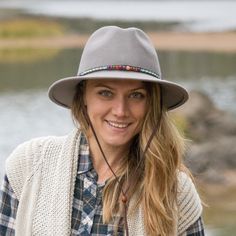 The Aspen takes style-conscious ladies to modern frontiers. Soft, warm wool felt in a Western-inspired silhouette feels at home even on urban ranges with a decorative hatband in multicolored beads. Internal adjustable sizing and sweatband make it feel as good as it looks. This hat makes a statement with both dresses and jeans, and looks smashing accessorized with boots and scarves. Felt Fedora, Mountain Hiking, Hat Band, Hat Making, Western Wear, Fedora, Wool Felt, Felt, Wool