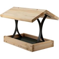 a wooden table with metal legs and a wood tray underneath it that has a black base