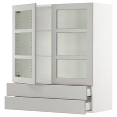 a white cabinet with glass doors on the front and bottom shelves in between it's sides