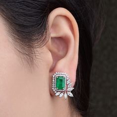 4.14TCW Emerald and Diamonds in 10k 14k 18K Solid White Gold Earrings Studs Natural Certified Zambian Colombian Halo Wedding Christmas Gift for Her Handmade Fine Jewelry Details :- Item Code:- SEE-1093 Gross Weight :- 6.17 gm 18k White Gold Weight :- 4.902 gm Diamond Weight :- 2.20 ct. (Si Clarity Hi Color Certified Diamonds) Emerald Weight :- 4.14 ct. Earrings Length :- 20.70 mm Earrings Width :- 16.33 mm Earrings Height :- 4.78 mm ≫ FAQ below for more detail. ✦ Sizing We can adjust most items Fine Jewelry Party Earrings With Halo Design, White Gold Halo Design Earrings For Parties, Elegant Emerald Diamond Earrings, Green Diamond Cut Wedding Earrings, Green Diamond Cut Earrings For Wedding, Elegant Green Earrings With Halo Design, Elegant Green Diamond Cut Earrings, Elegant Green Plug Earrings For Wedding, Emerald Earrings With Diamond Accents