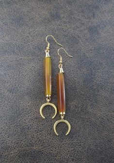 Extra long orangish brown carved bone dangle earrings with French hooks Horn Earrings, Bone Carving, Bones, Jewelry Earrings Dangle, Dangle Earrings, Jewelry Earrings, Carving, Orange