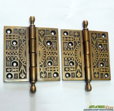 antique brass plated door hinges with sale sign on white background for 30 % off