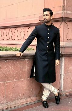 Elegant Nehru Jacket For Traditional Ceremonies, Elegant Long Sherwani For Traditional Ceremonies, Traditional Semi-formal Sherwani With Pallu, Elegant Long Bandhgala For Traditional Ceremonies, Semi-formal Bollywood Style Fitted Sherwani, Fitted Bollywood Sherwani For Semi-formal Occasions, Fitted Long Sherwani For Groom, Long Bandhgala With Dabka For Groom, Bollywood Style Sherwani For Diwali