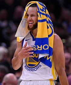 a basketball player with a towel on his head