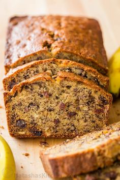 sliced loaf of banana nut bread on a cutting board