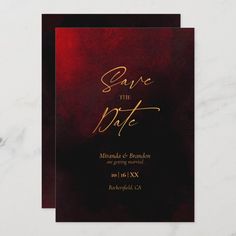 save the date card with gold lettering on a red and black watercolored background