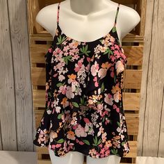 Brand: A New Day Size: X Small Condition: Nwt Color: Navy Floral The Colors In This Tank Are Vibrant And Beautiful. A Must See Item. The Ruffle Front Is Figure Forgiving And Makes This Item A Little More Dressy. It Also Has Adjustable Straps. Floral Print Top With Ruffled Straps For Summer, Spring Floral Print Tank Top With Ruffled Straps, Spring Floral Tank Top With Ruffled Straps, Casual Tops With Floral Print And Ruffled Straps, Casual Ruffled Camisole For Brunch, Summer Floral Print Tank Top With Ruffled Straps, Summer Camisole With Ruffles In Tank Style, Summer Ruffled Tank Camisole, Summer Tank Camisole With Ruffles