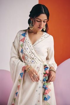 Ivory bell sleeves V neckline jacquard cotton angrakha style kurta embellished with bronze saddi, colorful resham and leaf tikki embroidery. Paired with a straight pant and a patch work embellished dupatta. - Aza Fashions Cream Long Sleeve Set With Cutdana, Festive White Traditional Wear With Woven Motifs, Anarkali White Kurta With Motifs, White Dupatta With Woven Motifs For Transitional Season, White Dupatta With Woven Motifs For Wedding, Festive White Dupatta With Woven Motifs, Transitional White Dupatta With Woven Motifs, Transitional White Traditional Wear With Woven Motifs, Festive White Anarkali Set With Motifs