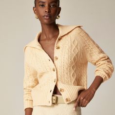 Collared cable-knit cardigan sweater Trendy Long Sleeve Cable Knit Sweater Coat, Classic Long Sleeve Cable Knit Outerwear, Elegant Cable Knit Sweater For Spring, Trendy Cable Knit Sweater Coat For Spring, Chic Fitted Cable Knit Cardigan, Textured Knit Sweater Coat, Trendy Fall Cable Knit Sweater Coat, Trendy Cable Knit Sweater Coat For Fall, Elegant Cable Knit Winter Cardigan