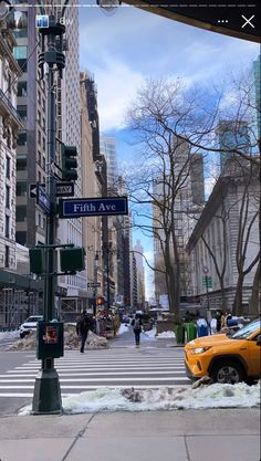 a street sign on the corner of fifth avenue