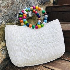 💥Introducing our Plastic Canvas Bag with a delightful twist of bohemian chic! 💥This Authentic Handmade beauty deserves a prime spot in your summer tote collection. 💥 Crafted with love using Crochet Raffia, this oversized handbag boasts a stylish Straw Bag design that perfectly complements the wooden beaded handle. 💥 It's the perfect accessory for your next beach getaway or vacation, and makes for an unforgettable Mothers Day gift or special surprise for that special someone.  💥Embrace the r Bohemian Beaded Bags For Vacation, Summer Bohemian Beaded Shoulder Bag, Bohemian Beaded Shoulder Bag For Beach, Bohemian Beaded Shoulder Bag For The Beach, Bohemian Beaded Shoulder Bag For Summer, Bohemian Beaded Beach Bag For Summer, Bohemian Beaded Crochet Bag For Summer, Bohemian Beaded Shoulder Bag For Vacation, Bohemian White Bag For Vacation