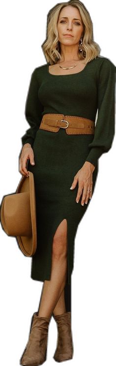 a woman in a green dress and brown boots is posing for the camera with her hand on her hip