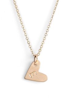 From humble beginnings to a fully staffed warehouse in Oregon, Nashelle remains true to its original purpose-handmade jewelry crafted with love and intention. The heart initial necklace is no different-with a hand-stamped pendant anchored by a single ring, it makes for a perfect layering piece. Style Name:Nashelle 14K-Gold Fill Initial Mini Heart Pendant Necklace. Style Number: 5143637. Available in stores. Simple Rose Gold Jewelry With Heart Charm, Simple 14k Gold Jewelry For Valentine's Day, Simple Personalized Heart Pendant Jewelry, Minimalist Heart Charm Jewelry For Anniversary, Simple Heart Charm Jewelry For Mother's Day, Minimalist Heart Charm Jewelry For Anniversary Gift, Everyday Initial Heart Pendant Necklace For Mother's Day, Personalized Heart Pendant Initial Necklace For Everyday, Everyday Handmade Heart Pendant Jewelry