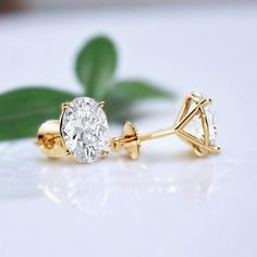 2 Carat Oval Cut Stud Moissanite Screw Back Earring 14K Solid Yellow Gold Solitaire Earrings 1 Carat Each Stud Earring anniversary Gifts 𝐏𝐥𝐞𝐚𝐬𝐞 𝐧𝐨𝐭𝐞: The listed price is for MOISSANITE stones, if you want other stones please DM us. (We provide Lab Grown Diamonds(CVD) as well in the same band on request only) ✥ 𝐘𝐎𝐔𝐑 𝐏𝐔𝐑𝐂𝐇𝐀𝐒���𝐄 𝐖𝐈𝐋𝐋 𝐈𝐍𝐂𝐋𝐔𝐃𝐄 ✥ ➳ Free Shipping ➳ Free EarRing Box ➳ Free Gift Box Wrapping ➳ Free Engraving (up to 6 Characters) ➳ 100% Satisfaction ✥ 𝐒 𝐓 Box Wrapping, 6 Characters, Yellow Gold Solitaire, Solitaire Earrings, Earring Box, Forever One Moissanite, Free Earrings, Wedding Jewelry Earrings, Screw Back Earrings