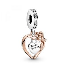 PRICES MAY VARY. Rose Flower Charm: Deliver a message of love with this delicate heart charm; the frame features intricate rose petal and leaf details, while the padlock includes the engraving “Love forever” Compatible with Pandora Moments: Pandora Moments is a way to say something about who you are through every charm and bracelet you choose and how you choose to wear it Sterling Silver Jewelry: Silver is known for its soft, white surface and is Pandora's signature metal, with the majority of o Romeo Und Julia, Diy Jewelry Gifts, Pandora Heart, Heart Shaped Frame, Heart Rose, Bracelet Pandora, Pandora Bracelet Charms, Pandora Silver, Love Forever