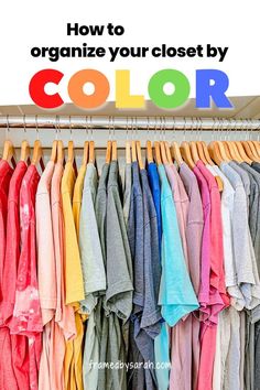 an organized closet with clothes on hangers and the words how to organize your closet by color