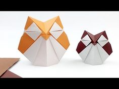 an origami owl is shown in three different colors and sizes, including orange, red, white, and grey