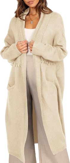 Stay warm and cosy in this Winter Beige Cardigan. Made from a thick knit, this long-sleeved cardigan sweater boasts a maxi silhouette and a classic beige hue, making it perfect for everyday wear. ACRYLIC:45%;POLY:28%;NYLON:27% Material: Women's Chunky Long Cardigan, made of high quality fabric, soft and skin-friendly, fall and winter fashion knitted long sleeve front placket cardigan Brand Size Dress Bust Waist Hip XS 0-2 31-32.5'' 23-24'' 31-34" S 4--6 33-35'' 25-26'' 35-37" M 8--10 35-36'' 27- Cream Knit Sweater Coat For Cold Weather, Cream Knitted Fall Cardigan, Fall Cream Knitted Cardigan, Winter White Knit Sweater Coat For Winter, Cozy Winter White Sweater Coat For Fall, Cream Soft Knit Cardigan For Cold Weather, Cream Soft Knit Cardigan For Fall, Winter Cream Sweater Coat For Layering, Winter White Knit Sweater Coat For Fall