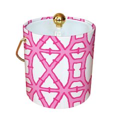 a pink and white container with gold handles on the handle is sitting in front of a white background