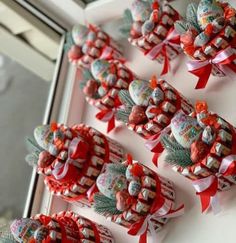 some candy wrapped in red and white bows