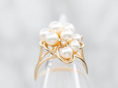 This exquisite ring is a lovely choice for luxurious jewelry. Crafted with yellow gold and featuring beautiful pearls and diamonds, it is sure to draw attention. Wear it for special occasions or everyday elegance.Metal: 14K Yellow GoldGem: Pearls Gem Measurements: 3.8 mm, RoundAccents: 3 Diamonds totaling .04 Carats, I in Clarity, G-H in ColorRing Size: 4.25Marks: "14K 585" Stamped on the inside band Luxurious Jewelry, Diamond Cluster Ring, Diamond Cluster, Gold Pearl, Cluster Ring, Luxury Jewelry, To Draw, Special Occasion, Gems