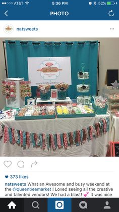 the table is full of sweets and treats for guests to take home from their wedding