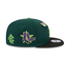 the los angeles angels'new era 59fifty fitted hat is green and purple