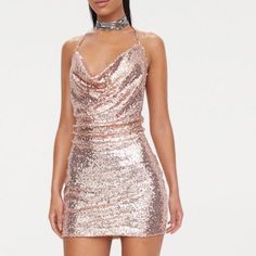 Sequin Gold Tie Dress. I Bought This For A Formal Before Having To Cancel My Card Not Allowing Me To Return. Never Worn. Mine Is A Us 6, Model Wears A Us 4 Feminine Mini Party Dress, Feminine Dresses For Night Out Party Season, Feminine Sequined Mini Dress For Cocktail, Chic Backless Mini Dress For Holiday Party, Feminine Backless Bodycon Dress For Party, Chic Backless Holiday Dresses, Flirty Fitted Sequin Dress For Spring, Spring Backless Dress For Holiday Party, Fitted Mini Dress For Summer Holiday Party