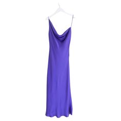 Stunning Stella McCartney purple satin slip dress. Bought for £1075 and worn once - has been dry cleaned. Made from glossy purple acetate mix satin, it has a super flattering bias cut with asymmetrical draped strappy neckline and fluted midi hem. Size IT40/UK8. Measures approx - bust 32”, waist 30”, hips 36” and length 48”. Purple Bias Cut Dress For Evening, Purple Sleeveless Satin Finish Dress, Purple Satin Sleeveless Dress, Purple Silk Bias Cut Dress, Formal Fitted Purple Slip Dress, Purple Sleeveless Silk Satin Dress, Purple Silk Satin Evening Dress, Fitted Silk Satin Dress In Purple, Purple Satin Evening Dress