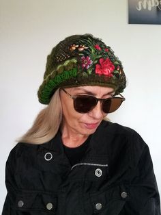 Green Wool Beanie Hat for Women Floral Embroidered Warm Slouchy Beanie This green embroidered beanie hat is designed and handmade by me. The wool crochet beanie is made of very soft olive green angora wool yarns, floral patches,sequins fabric,Preciosa glass beads. Hat trim circumference: About 61 cm/ 24 inches This winter boho woman beanie is very lightweight,stretchy and comfortable!Machine wash on a gentle program. This unique handmade hat could be your jewelry, fashion accessory and stylish a Green Crochet Hat With Short Brim For Winter, Green Short Brim Crochet Hat For Winter, Bohemian Green Beanie Hat, Green Bohemian Crochet Beanie Hat, Green Hand Knitted Brimmed Hat, Green Crochet Beanie Hat, Hand Knitted Green Beanie, Green Hand Knitted Hat One Size, Green Hand Knitted One Size Hats