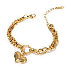 This is a super, on-trend heart charm bracelet with mixed chain. The chain is a combination of curb and rolo style. The heart is an elegant, puffed heart motif. It is adjustable from about 6.5-7.5” and is plated in real gold. It will match other 14k gold pieces very nicely if your stacking with other gold pieces. This would make a wonderful gift that any woman would cherish. Textured Bracelet, Sentimental Jewellery, Heart Choker Necklace, Heart Pendant Gold, Jewelry Fashion Trends, Gold Plated Bracelets, Pendant Bracelet, Metal Bracelets, Jewelry Lover