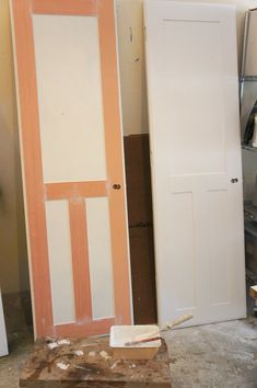 an unfinished door is in the process of being painted