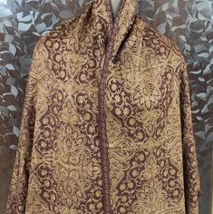 "🔷Vibrant Brown color 100% semi pashmina beautiful \"Jamavar\" Shawl/stole 80\"×28\" is fully fully embroidered by our talented and young artist. Jamavar means which is full covered/fill with embroidery. This shawl/shawl is embroidered by Golden color thread to make shawl/stole more attractive and beautiful.And the thread of this embroidery is silk thread. 🔷The Product is made of combination of wool and Pure Pashmina. 🔷The shawl/stole have beautiful handmade fringes too in the two end. 🔷This Traditional Brown Pashmina Shawl, Brown Embroidered Pashmina Shawl, Brown Pashmina Shawl With Traditional Drape, Traditional Silk Shawl For Winter, Traditional Brown Pashmina Shawl With Patterns, Traditional Brown Pashmina Shawl For Winter, Traditional Brown Silk Shawl, Traditional Jamawar Pashmina Shawl For Eid, Traditional Brown Jamawar Dupatta