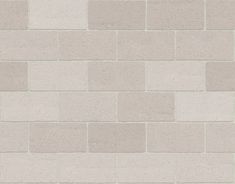 a white brick wall textured with cement