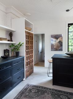 the kitchen is clean and ready to be used as a dining room or living room