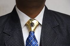 do you want o show your excitement ? luxurious gold plating tie knot Cover-Lion Face Gold Plated Tie Knot Cover - Statement Men's Accessory-statement piece for men's attire Trims: Brown Lead Free Chrome Plated Silver Handmade Product Vintage Product Product Finish : 925 Sterling Silver Product Material:   925 Sterling Silver Product Trims: Golden Lead Free Chrome Plated Silver Product Dimensions : 54.67 MM (Length) Product Dimensions : 55.08 MM (Width ) Product Origin : Made In India Product Sha Luxury Gold Suit And Tie Accessories For Formal Occasion, Luxury Gold Tie For Formal Occasions, Luxury Gold Tie For Black Tie Events, Visa Debit Card, Personalized Tie, Silver Tie, Mens Attire, Lion Face, Face Design