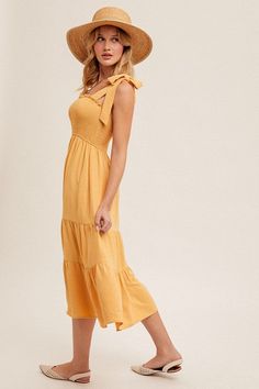 Product Description: Smocked bodice shoulder tie straps tiered midi dress hidden side pockets elastic waistline 100% polyester gentle wash cold do not bleach hang to dry cool iron Tiered Midi Dress, Dress Romper, Skirt Top, Smocking, Sweater Top, Sweater Cardigan, Jumpsuit Romper, Bodice, Shopping Outfit