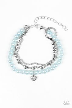 A strand of pearly blue beads, shimmery silver chains, and a row of glistening silver hearts layer around the wrist. A dainty silver heart stamped with the word, "love" swings from the beaded strand for a romantic finish. Features an adjustable clasp closure.

 Sold as one individual bracelet. Heart Stamp, Word Love, Silver Chains, Romantic Look, Paparazzi Accessories, Blue Pearl, Mean It, Paparazzi Jewelry, Blue Bracelet