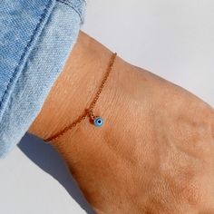 Tiny evil eye bracelet/Minimal bracelet/Greek eye bracelet/Gift for her/birthday Gift/ Gift for good luck/evil eye amulet/Nazar bracelet 💙The eye bracelet is perfect for every occasion and is the perfect gift for every woman. The bracelet is made with Stainless steel Chain and glass eye! 💕Details: Length 16 cm(6.29 inches) Extension 5 cm(1.96 inches) Pendant evil eye diameter : 1 cm (0.39 inches) High quality gold plated stainless steel bracelet with evil eye pendant . 100% hypoallergenic-tota Nazar Bracelet, Evil Eye Amulet, Bracelet Minimal, Greek Eye, Minimal Bracelet, Eye Details, For Good Luck, Gift For Her Birthday, Eye Pendant