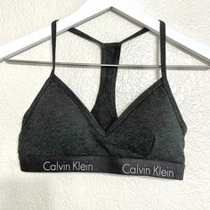 Calvin Klein Casual Lounge Wear Cotton Sports Bra Size Small Brand New Never Been Worn Cotton / Elastic Stretchy Sports Bra V Neck Puckered Cups Removable Padding Thin Strappy Racerback Style Calvin Klein Logo Spell Out Branding Around Chest Band Excellent Unused Condition New Make Me An Offer Casual Lounge Wear, Cotton Sports Bra, Racerback Sports Bra, Sports Bra Sizing, Womens Calvin Klein, Heather Gray, Women's Intimates, Heather Grey, Calvin Klein