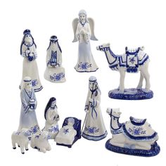 a group of figurines with blue and white designs