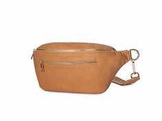 a tan leather fanny bag with gold zippers