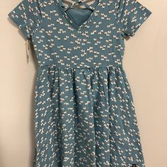 Cute Floral Blue Dress Nwt Casual Light Blue Cotton Dress, Casual Cotton Twirl Dress With Short Sleeves, Casual Cotton Fitted Twirl Dress, Casual Fitted Spring Twirl Dress, Casual Fitted Twirl Dress For Spring, Light Blue Cotton V-neck Dress, Cute Fitted Blue Twirl Dress, Cute Blue Fitted Twirl Dress, Blue Fitted Cotton Twirl Dress