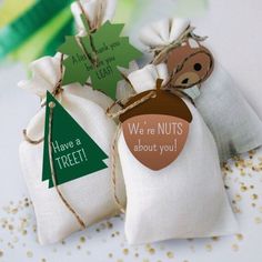 two small bags filled with nuts sitting on top of a table