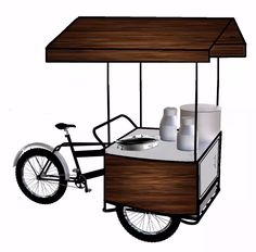 a small cart with two cups on the front and one cup on the back, sitting next to a bicycle