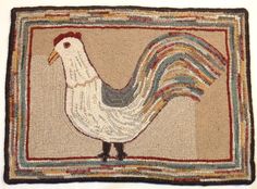 a rug with a rooster on it