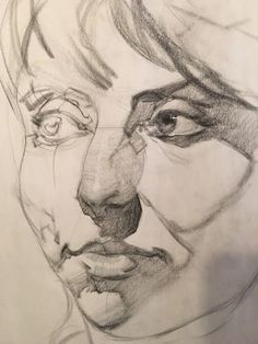 a pencil drawing of a man's face