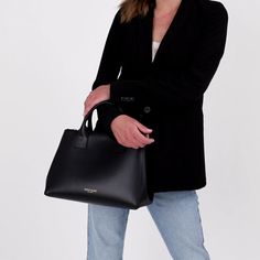 Luxury leather women's work bag, the Bella can be worn as a mini crossbody, satchel, or a shoulder purse. Mini, medium, or large bag sizes are available in 50+ colors. Discover yours! Luxury Black Faux Leather Satchel, High-end Black Satchel Shoulder Bag, Business Shoulder Bag With Detachable Handle, Black, High-end Black Satchel With Removable Pouch, Womens Work Bag, Black Satchel With Gold-tone Hardware Shoulder Bag, Teddy Blake, Crossbody Satchel, Mini Crossbody