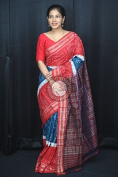 Finest pure handwoven sambalpuri cotton saree with traditional motifs woven by the master weavers of Sambalpur, Odisha. It has lovely patterns and is world-famous for its stunning colours, texture and designs. Specification:  Occasion: Festive Wear Fabric: Khandua Cotton Primary Color: Blue Secondary Color: Maroon Material : Silk Pattern: Motif Border Type: Ikkat Border Size: Medium Blouse Piece: Included Care: Dry Clean Disclaimer : This is a genuine handwoven piece, & that could expect unevenn Cotton Saree With Woven Motifs In Blue, Traditional Cotton Saree With Bandhani Print, Cotton Ikat Print Dupatta For Diwali, Red Tussar Silk Traditional Wear With Ikat Print, Red Ikat Print Tussar Silk Traditional Wear, Multicolor Cotton Saree With Woven Motifs, Festive Cotton Saree With Ikat Print, Festive Cotton Ikat Print Dupatta, Traditional Ikat Print Cotton Silk Dupatta